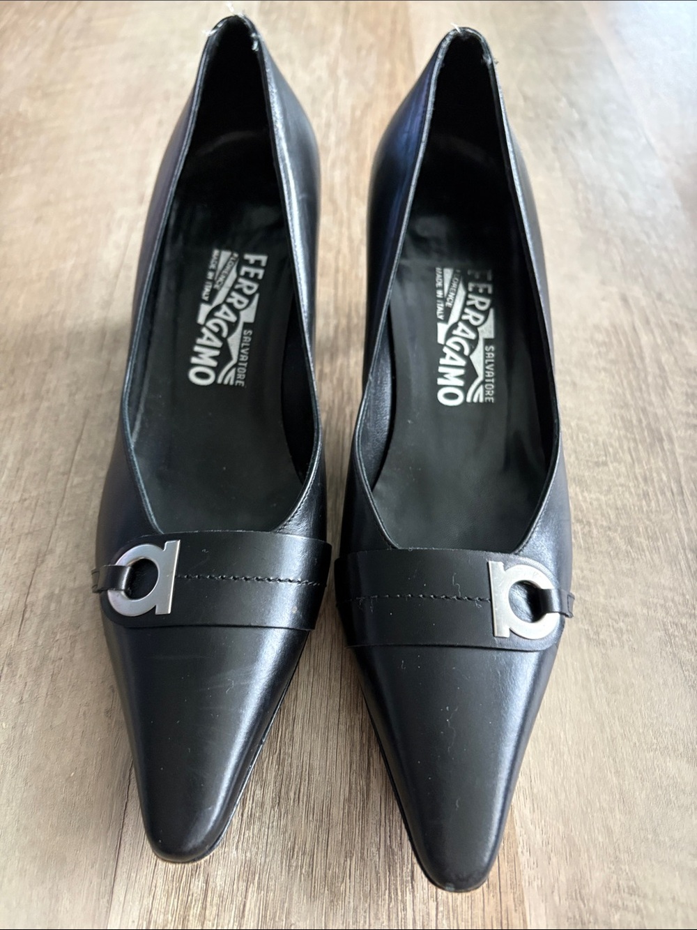 Salvatore Ferragamo Black Pointed Leather Pumps with Silver Gancio Accent